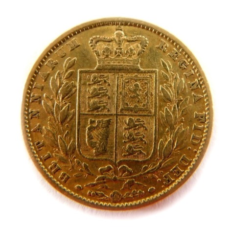A Victoria young head full gold sovereign, dated 1860.