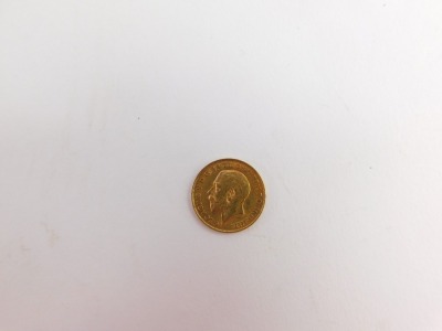 A George V half gold sovereign, dated 1911. - 2