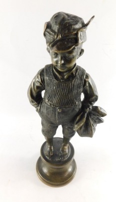 A Continental late 19thC bronze figure of an urchin boy, modelled standing holding a food sack, on a circular socle, unsigned, 37.5cm high. - 3