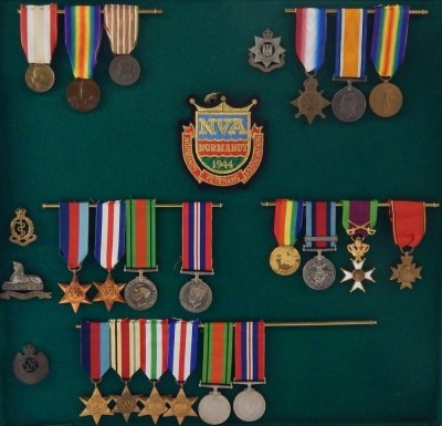 A collection of medal groups and records relating to the Pusterla family, including family trees, birth and marriage certificates, photographs and printed ephemera. The framed and glazed medal groups comprise a WWI Italian set of three, the Inter-Allied V