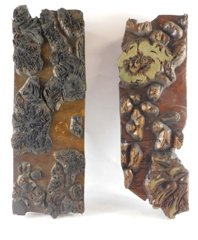 Two 19thC wooden printing blocks, one with flower pattern, the other with leaf detailing, raised metal prints, both 46cm long.