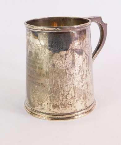 An Edward VII silver tankard, engraved 'IFA 1910 presented by Mr Philip Mighell won by J Hawkins', Birmingham 1905, 10¾oz.