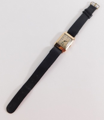 A 9ct gold cased James Walker gentleman's wristwatch, with a rectangular watch head, with seconds dial, on a black leather strap, the dial 3cm x 2cm, 16.8g all in, in fitted case. - 2