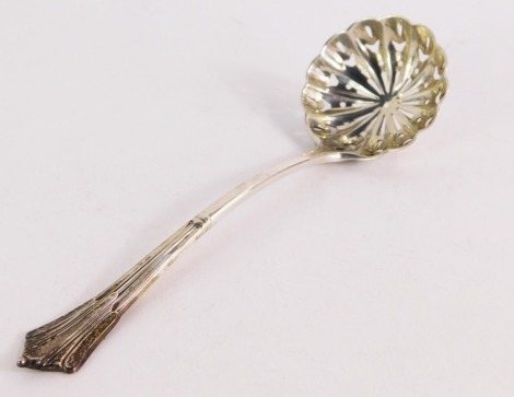 A Victorian silver sugar sifting spoon, decorated in the Albany pattern, London 1899, 1oz.