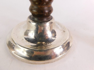 A pair of George V loaded silver candlesticks, each with a turned graduated wooden stem, with silver top and circular base, Chester 1926, 15cm high. - 3