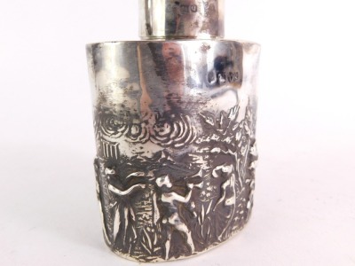 A Victorian silver tea canister, embossed with Grecian figures, trees and temples, hallmarks rubbed, 3¾oz. - 2