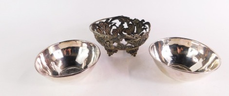 A group of silver and silver plated wares, comprising a pair of bowls, engraved to the base internally with Celtic knot designs, stamped 925, 7¼oz, together with a Continental silver plated basket frame, embossed with hunting figures, lionesses and and sc