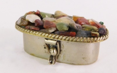 A stone set pill box, the oval pill box with semi precious stone top, white metal marked Alpaca Mexico.