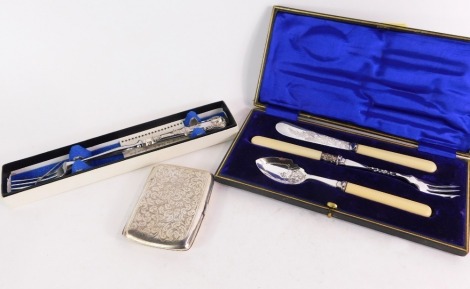 A group of silver and plated wares, comprising an Edward VII silver cigarette case, with floral engraved detailing, with vacant shield, Birmingham 1905, a silver plated and bone handled supper set and a silver handled stainless steel pickle fork, both box