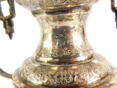 An Eastern twin handled vase, of baluster form, repousse decorated and engraved with birds and flowers, marks to neck, white metal, 12¾oz. - 3