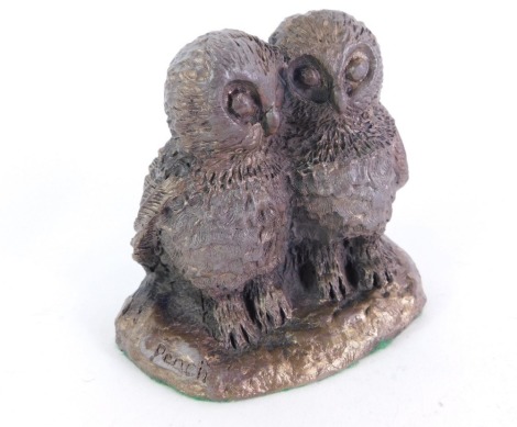 After Peach. A bronzed resin model of two owls, 10cm high, on cushioned base.