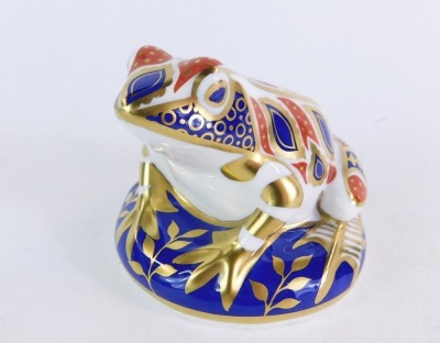 A Royal Crown Derby frog paperweight, seated on blue ground, silvered stopper, 9cm high, boxed. - 4