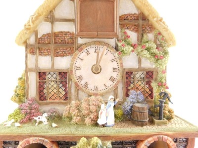 A Bradford Exchange Country Days cuckoo clock, 28cm high. - 2