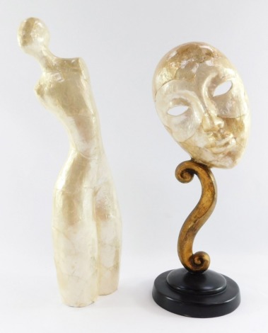 Two modern art sculptures, comprising a Capiz design mother of pearl type finish figure, 39cm high, and a similar mask in white finish, 38cm high.