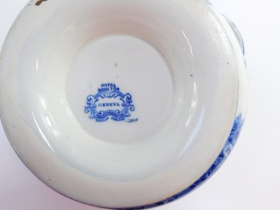 Blue and white ceramics, comprising a Royal Doulton Geneva pattern tureen and cover (AF), 26cm high, pair of Wedgwood Ferrara pattern dinner plates, 25cm diamater, and a Wedgwood Etruria embossed Queensware vase, 28cm high. (4) - 5