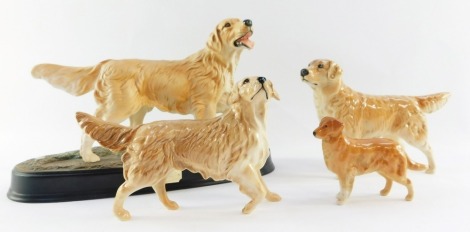 A group of Retriever dog figures, comprising Royal Doulton Retriever, two Beswick Retrievers, Royal Doulton Retriever on ebonised oval base, largest 20cm x 28cm, (4, AF)