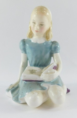 A Royal Doulton porcelain figure modelled as Alice, HN2158, 13cm high.