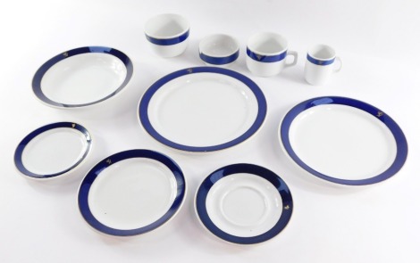 A group of Porsgrund Regal Norwegian dinner wares, to include cup and saucer, coffee can, side plates, ash tray, dinner plates, etc., each with a royal blue outer border and applied gilt emblem of a lion. (10)