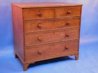 A 19th century oak and pine chest of drawers with two short and three long drawers