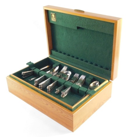 An Arthur Price EPNS A1 cased canteen of cutlery, with eight place setting, in a pine fitted case, 14cm high, 46cm wide, 31cm deep.