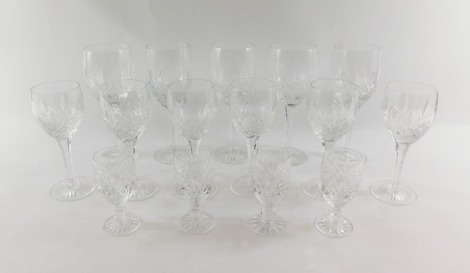 A group of Waterford and Edinburgh crystal glassware, to include a set of five large bowl wine glasses, a set of six small wine glasses and four Waterford crystal sherry glasses. (1 tray)