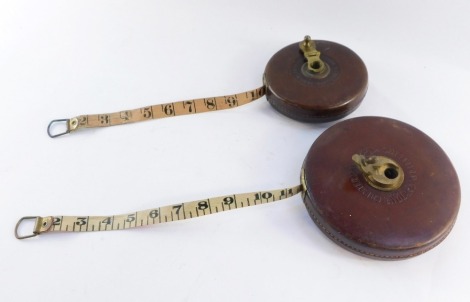 Two vintage tape measures, comprising Chesterman JC Chesterman of Sheffield 100ft reel in leather case, and a John Rabone & Sons of Birmingham 66ft tape measure, in leather case.