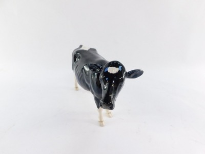 A Beswick Shetland cow, model 4112, 13cm high. - 5
