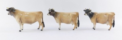 Three Beswick Jersey bull and cows, CH Newton Tinkle, comprising two cows, 11cm high, and a bull, 12cm high. - 2