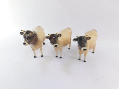 Three Beswick Jersey bull and cows, CH Newton Tinkle, comprising two cows, 11cm high, and a bull, 12cm high. - 5