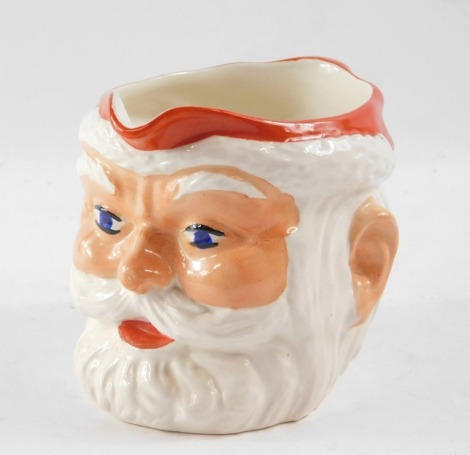 A Sadler vintage 1950's Santa Claus Bird's Custard jug, 11cm high.