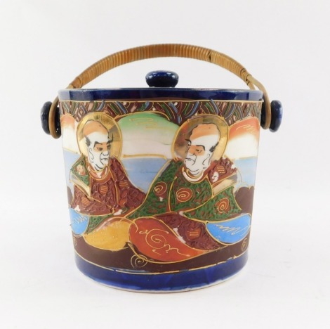 A 1920's Japanese biscuit barrel and cover, with intertwined reeded handle, Export Ware, 13cm high.