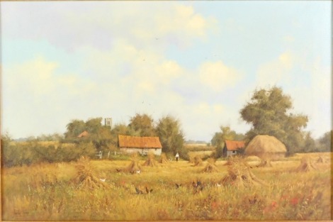 James Wright (British, b.1935). Farmyard scene with haystacks, oil on canvas, 39cm x 60cm, in gilt frame.