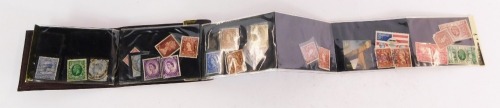 Philately. An album of used pre-decimal stamps, to include penny red, postage and Inland Revenue penny, half penny stamps, Silver Jubilee commemorative stamps, general letter office stamps, stamp booklet, etc. (all contained in one leather case)