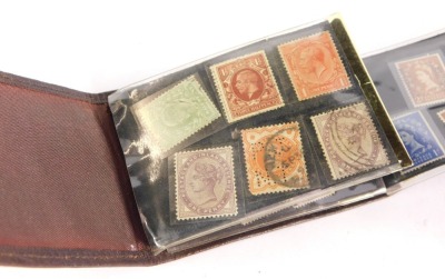 Philately. An album of used pre-decimal stamps, to include penny red, postage and Inland Revenue penny, half penny stamps, Silver Jubilee commemorative stamps, general letter office stamps, stamp booklet, etc. (all contained in one leather case) - 2