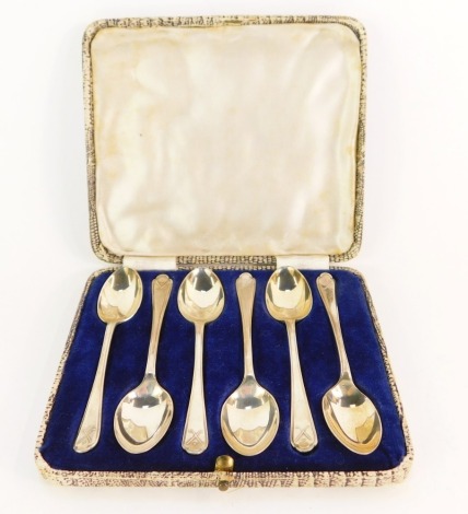 A set of six George V silver coffee spoons, with golfing emblem to top, Walker & Hall Sheffield 1932, 2¾oz. (boxed)