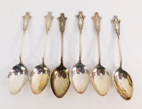 A set of seven George V Neo Classical design silver teaspoons, each with foliate embossed terminals, Birmingham 1926, 2½oz.