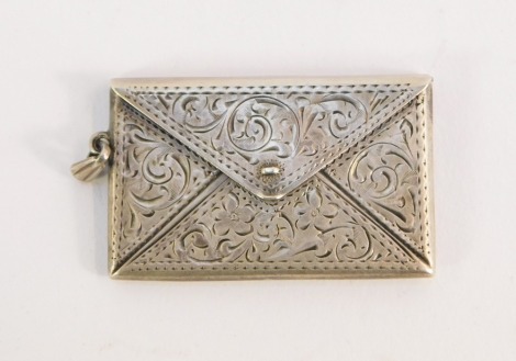 A silver stamp case, of twin division envelope form, with engraved foliate scroll decoration, ring chain attachment, stamped sterling silver, 9.4g.