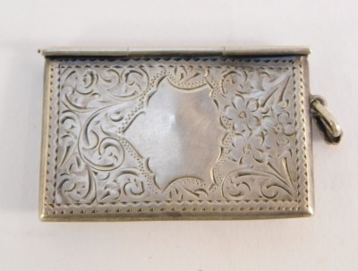 A silver stamp case, of twin division envelope form, with engraved foliate scroll decoration, ring chain attachment, stamped sterling silver, 9.4g. - 2