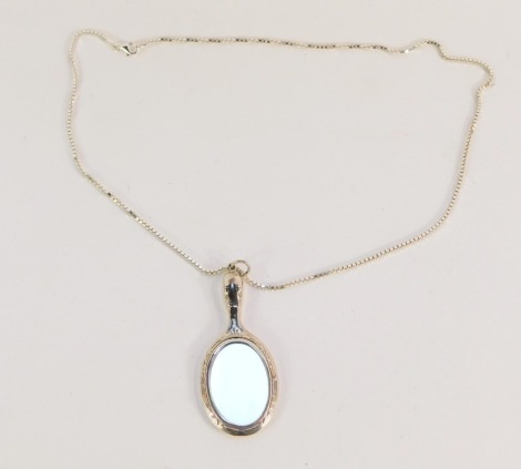 A silver miniature hand mirror pendant and chain, the neo-classical design hand held mirror, marked 925, on a box link chain, the pendant 8cm high, the chain 60cm long, 31.1g all in.