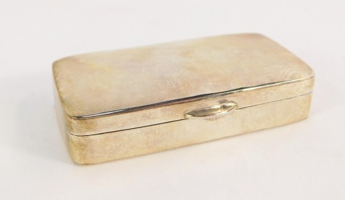 A silver pill box, of plain outer rectangular design and brushed interior, with import marks, stamped 925, 1oz, boxed.