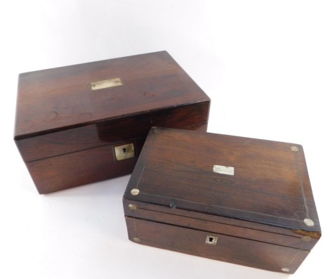 Two Victorian rosewood boxes, comprising one with mother of pearl inlay, and central shield marked Lindhand, 10cm high, 23cm wide, 15cm deep, the other with central mother of pearl panel, lacking interior, 13cm high, 31cm wide, 22cm deep.