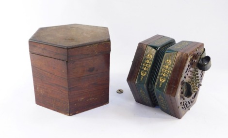 A C W Heathstone of London rosewood cased accordion, with brass inlay, green feather layers and material back bindings, twenty four buttons, in a wooden fitted hexagonal case. (AF)