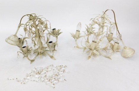 A pair of Laura Ashley cast white metal five branch chandeliers, each with leaf and vine droplet design, 36cm high.