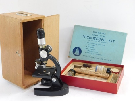 A Greekat microscope, 100x-600x, in fitted case, with a Britex Universal Microscope kit. (2)