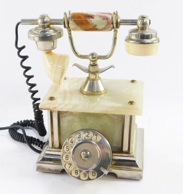 An onyx vintage telephone, with chrome overall finish and dial, 30cm high.
