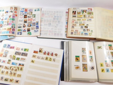 Philately. GB definitives and commemoratives, Papua Guinea, animals, Caribbean, birds, Malaysia, Tristan de Cunha, etc., in varios albums and stick books (a quantity)