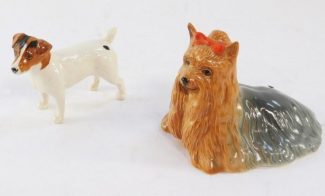 A Beswick Jack Russell Terrier, and a Beswick Yorkshire Terrier with bow. (2)