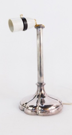 An Elkington loaded plated table lamp, on a reeded stem, on six point floral flared base, 24cm high. (AF)