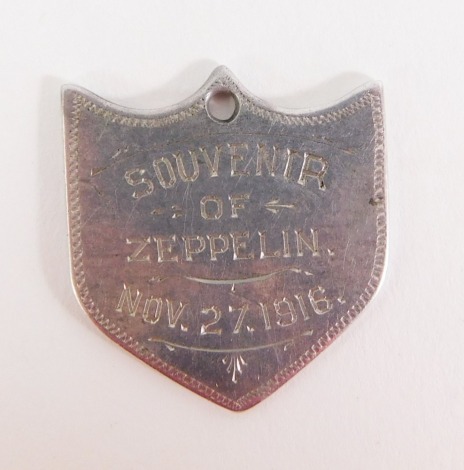 A souvenir medal for Zeppelin 27-11-1916, shot down over Hartlepool, the shield souvenir bearing the initials JWF, 2.5cm wide.