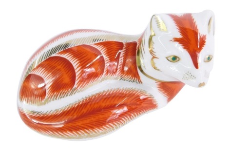 A Royal Crown Derby seated fox paperweight, in red, silver stopper, 10cm wide, boxed.